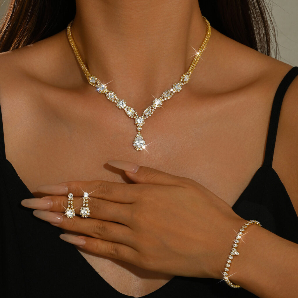 Women 4 Pcs Gold Tone Teardrop Rhinestone Jewelry Set,Necklace Dangle Earrings Ring Bracelet,Elegant Bridal Costume Accessories For Wedding Banquet Party Occasion
